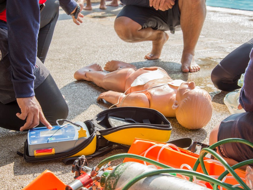 CPR child dummy drowning and use AED or PAD resuscitate